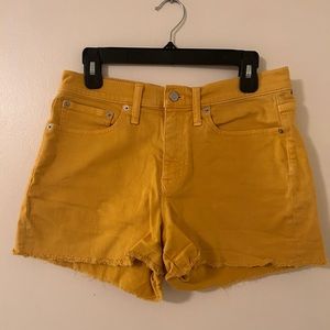 J.CREW mustard yellow cutoff shorts